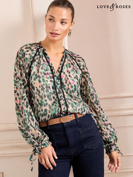 Love & Roses Ivory Animal Printed Notch Neck Poet Sleeve Tie Cuff Blouse (AL2836) | € 61