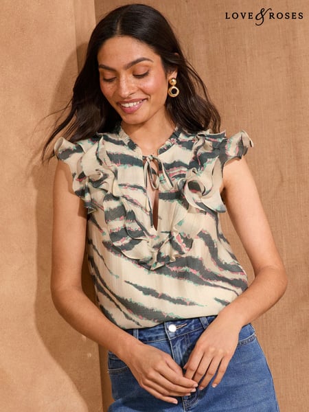 Love & Roses Ivory Zebra Short Sleeve Ruffle Blouse (AN7498) | € 61