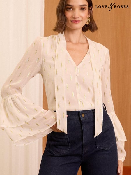 Love & Roses White Metallic Pussy Bow Flute Sleeve Blouse (AN8289) | € 33