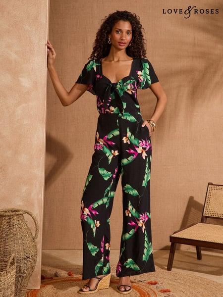 Love & Roses Black Tropical Tie Front Flutter Sleeve Jumpsuit (AW8885) | € 97