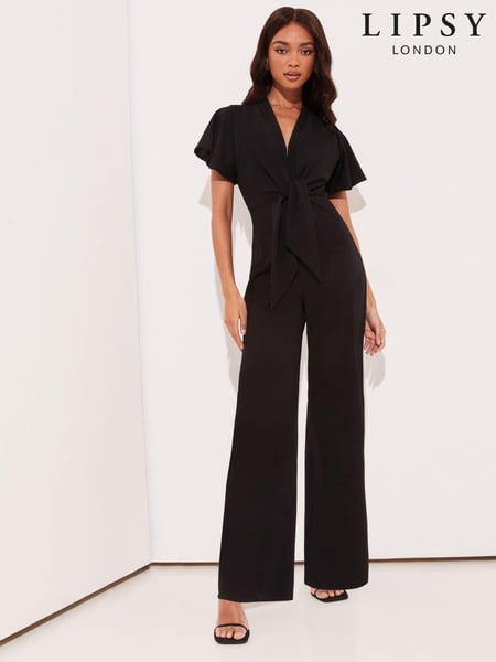 Lipsy Black Flutter Sleeve V Neck Tie Front Wide Leg Jumpsuit (E22954) | € 57