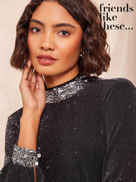 Friends Like These Black Jersey HIgh Neck Blouse with Sequin Detail (E30522) | € 27