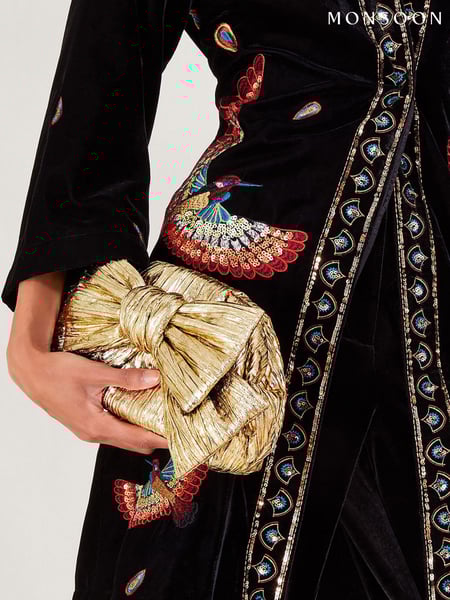 Monsoon Gold Tone Oversized Bow Metallic Bag (E55216) | € 86