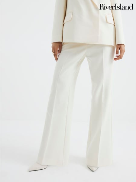 River Island Cream Slim Petite Flare Trousers (F69307) | € 62