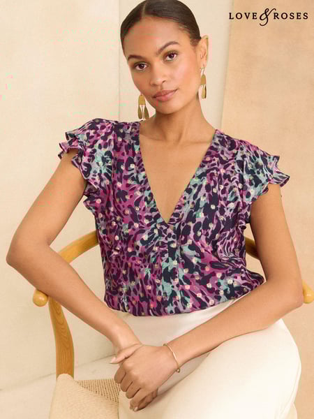 Love & Roses Pink Animal Metallic Ruffle V Neck Tie Back Blouse (N26289) | € 23
