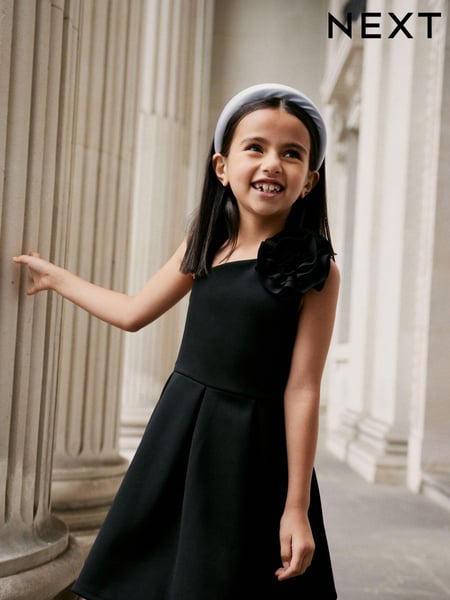 Black 3D Flower Corsage Asymmetric Scuba Occasion Dress (1.5-16yrs) (N32174) | € 5 - € 8