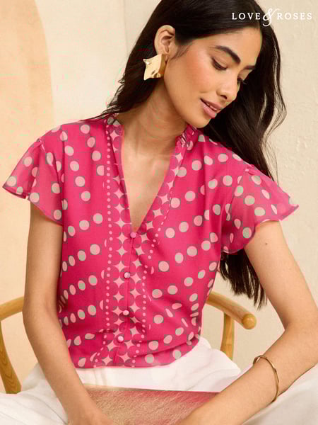 Love & Roses Pink Polka Dot V Neck Flutter Sleeve Blouse (N55154) | € 24