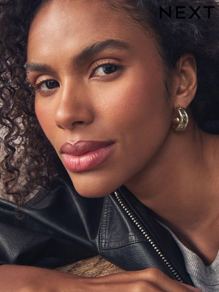Gold Tone Wave Baguette Stone Earrings (N74822) | € 8