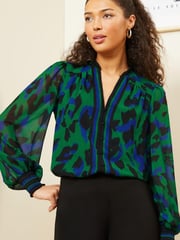 Love & Roses Green Animal Printed V Neck Puff Sleeve Blouse - Image 1 of 4