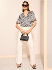 Friends Like These Black Polka Dot Printed Flutter Sleeve Keyhole Blouse - Image 2 of 4