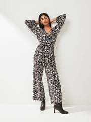 Black/White Long Sleeve Plisse Jumpsuit - Image 1 of 5
