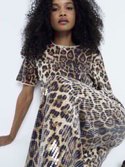 River Island Brown Leopard Print Sequin Trousers - Image 1 of 4