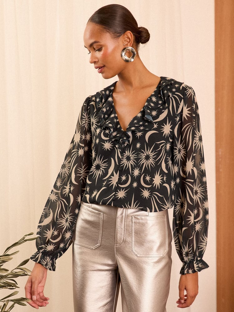 Love & Roses Black Star Ruffle Detail V-Neck Long Sleeve Blouse - Image 1 of 4 Love & Roses Black Star Ruffle Detail V-Neck Long Sleeve Blouse - Image 1 of 4