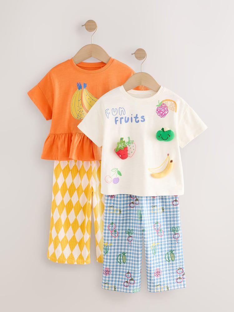 Orange Fruits 100% Cotton Top and Trousers Set 2 Pack (3mths-7yrs) - Image 1 of 7 Orange Fruits 100% Cotton Top and Trousers Set 2 Pack (3mths-7yrs) - Image 1 of 7