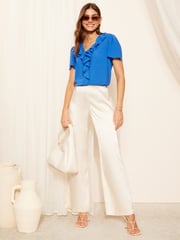 Friends Like These Blue Ruffle Front Puff Sleeve Blouse - Image 3 of 4