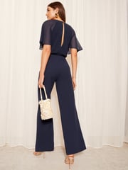 Friends Like These Navy Blue Petite Chiffon Flutter Sleeve Wide Leg Jumpsuit - Image 4 of 4