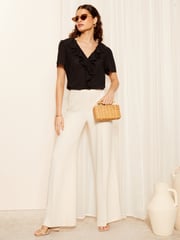 Friends Like These Seersucker Black Ruffle Front Puff Sleeve Blouse - Image 3 of 4