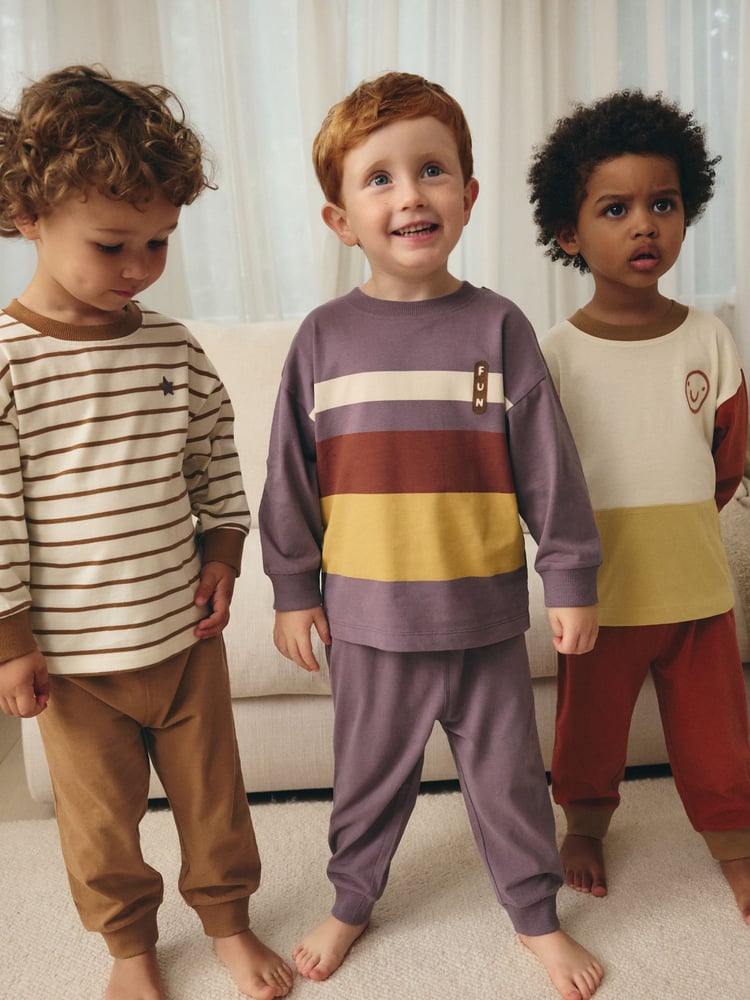 Red/Purple Stripes Snuggle Pyjamas 3 Pack (9mths-12yrs) - Image 1 of 8 Red/Purple Stripes Snuggle Pyjamas 3 Pack (9mths-12yrs) - Image 1 of 8