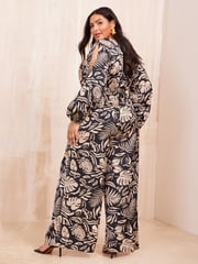 Curves Like These Black/White Long Sleeve Wrap Jumpsuit - Image 4 of 4