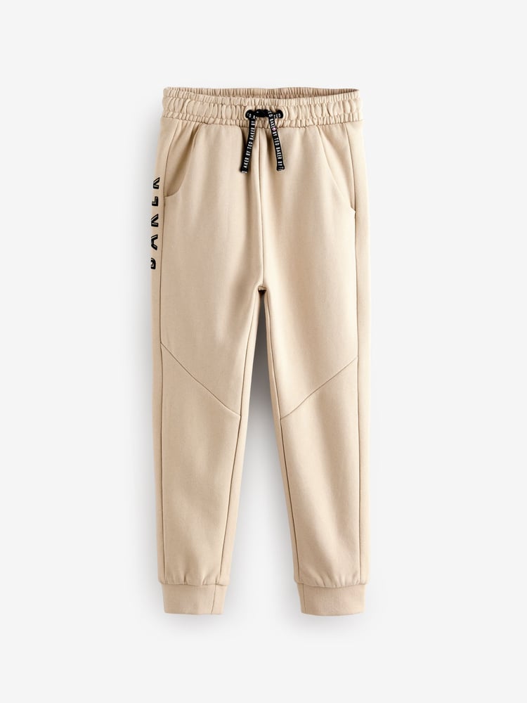 Baker by Ted Baker Navy/Stone 100% Cotton Joggers 2 Pack - Image 2 of 6 Baker by Ted Baker Navy/Stone 100% Cotton Joggers 2 Pack - Image 2 of 6