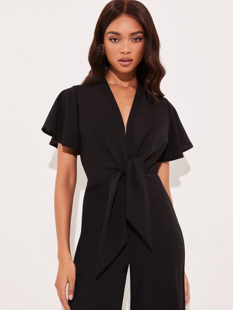 Lipsy Black Flutter Sleeve V Neck Tie Front Wide Leg Jumpsuit - Image 2 of 4 Lipsy Black Flutter Sleeve V Neck Tie Front Wide Leg Jumpsuit - Image 2 of 4