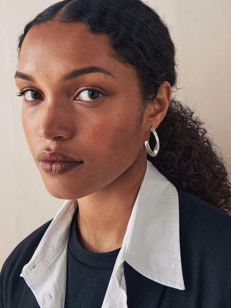 Silver Tone Twist Hoop Earrings - Image 1 of 4