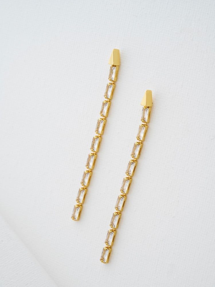 Ted Baker Gold Tone Isalie Crystal Baguette Slinky Drop Earrings - Image 1 of 7