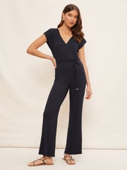 Friends Like These Blue Jersey Wide Leg Wrap Style V-Neck Summer Jumpsuit - Image 1 of 4