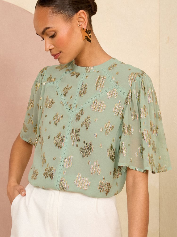 Love & Roses Green Metallic High Neck Flutter Sleeves Top - Image 1 of 4 Love & Roses Green Metallic High Neck Flutter Sleeves Top - Image 1 of 4