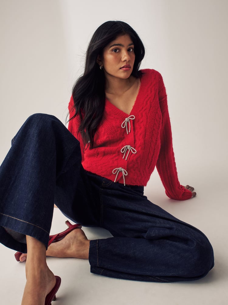 Red Sparkle Bow Button Cable Knitted Cardigan - Image 1 of 7
