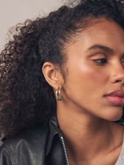 Gold Tone Wave Baguette Stone Earrings - Image 2 of 3
