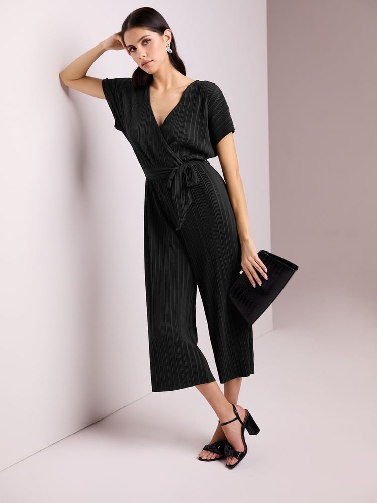 Black Plisse Short Sleeve V-Neck Wide Leg Belted Jumpsuit - Image 1 of 5
