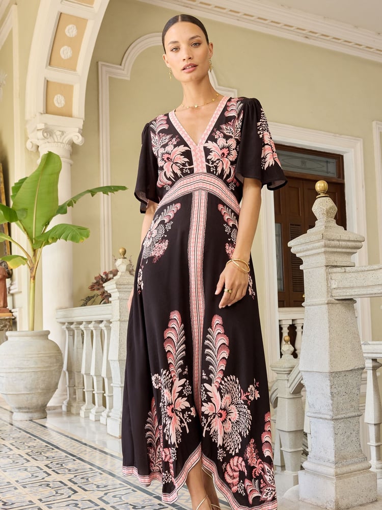 V&A | Love & Roses Pink and Black Printed V Neck Hanky Hem Midi Dress - Image 1 of 4