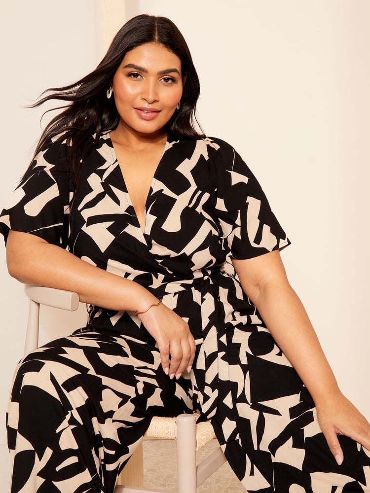 Curves Like These Black/White Flutter Sleeve Wide Leg Jumpsuit - Image 2 of 4 Curves Like These Black/White Flutter Sleeve Wide Leg Jumpsuit - Image 2 of 4