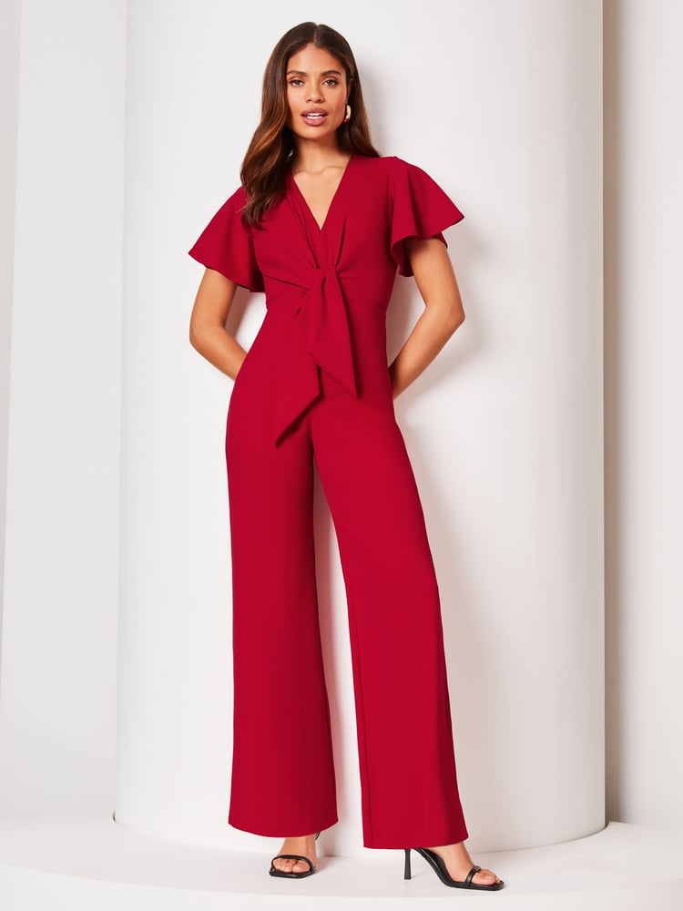 Lipsy Red Flutter Sleeve V Neck Tie Front Wide Leg Jumpsuit - Image 1 of 4 Lipsy Red Flutter Sleeve V Neck Tie Front Wide Leg Jumpsuit - Image 1 of 4