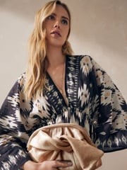 Natural Leather Bow Clutch Bag - Image 1 of 9